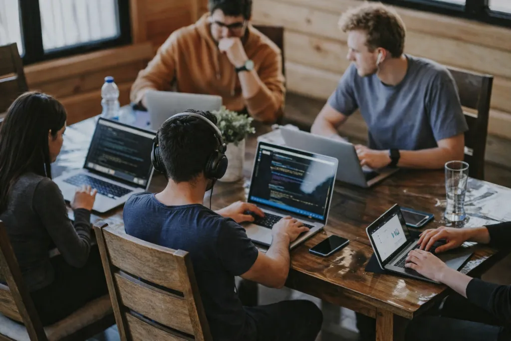 Team of developers working together at a table